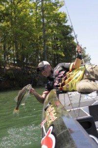 Jeff Kriet with a Bass Caught on a Big Worm - photo by Dan O'Sullivan