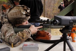 Grayson Sights in His Rifle - photo by Dan O'Sullivan