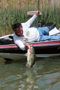 Mike Taylor Reaches for a Bass That ate the Snake