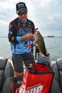 Brent Chapman loads his bag at Lake Cayuga