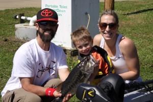 Vegas Iaconelli Shows off his Big Bass with his Mom and Dad, Mike Iaconelli and his wife Becky - photo by Dan O'Sullivan