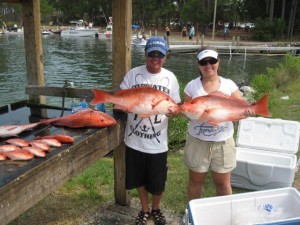 Dustin and wife Marylynn show off their catch from deep sea fishing